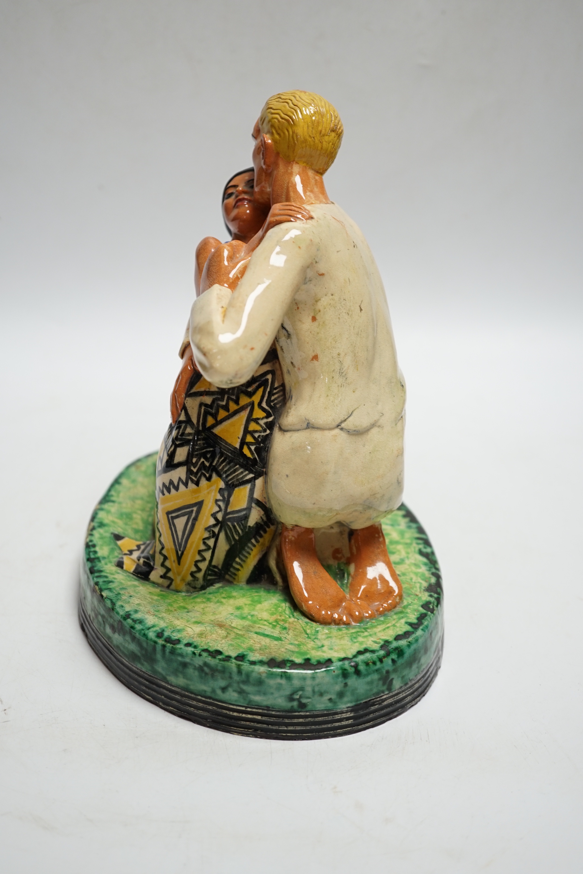 Dunstan Ford Smith, dated 1926, a pottery figure group, 21cm high